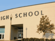 How Will School Choice Affect High School Athletics? A modern high school building. The image represents how open enrollment and school choice policies are reshaping high school athletics and competition.